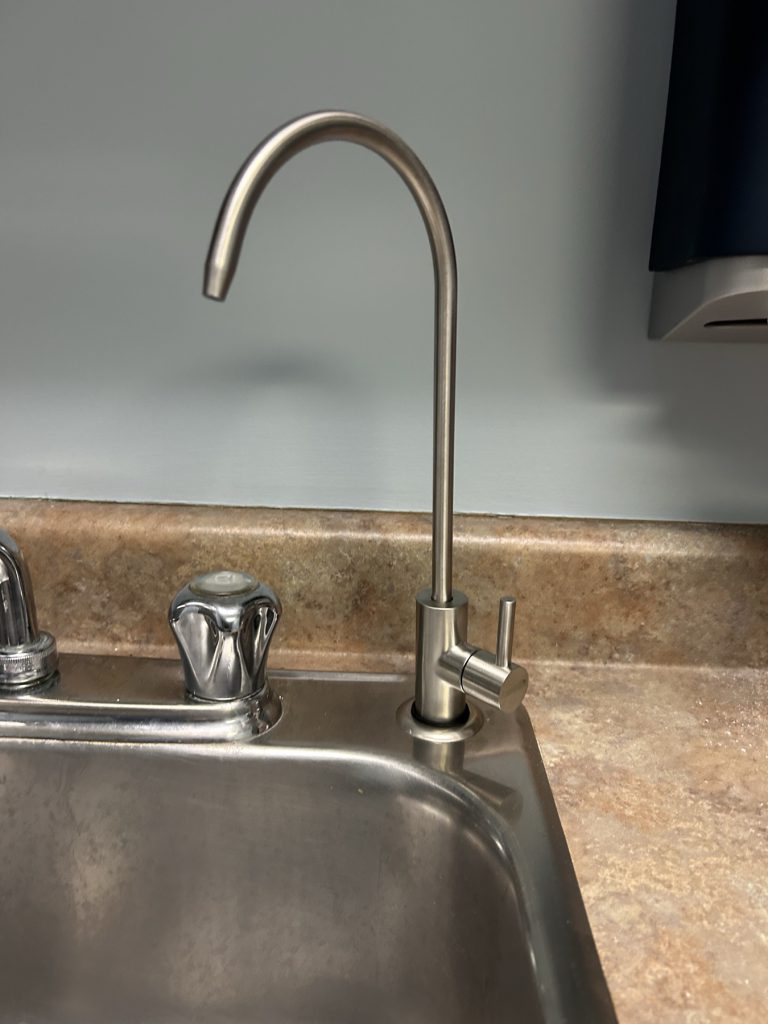 Brushed stainless dedicated drinking water faucet supplied by an Azuretics tankless reverse osmosis system